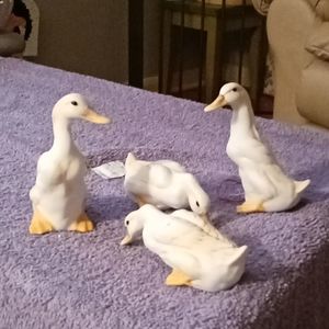 4 porcelain Ducks